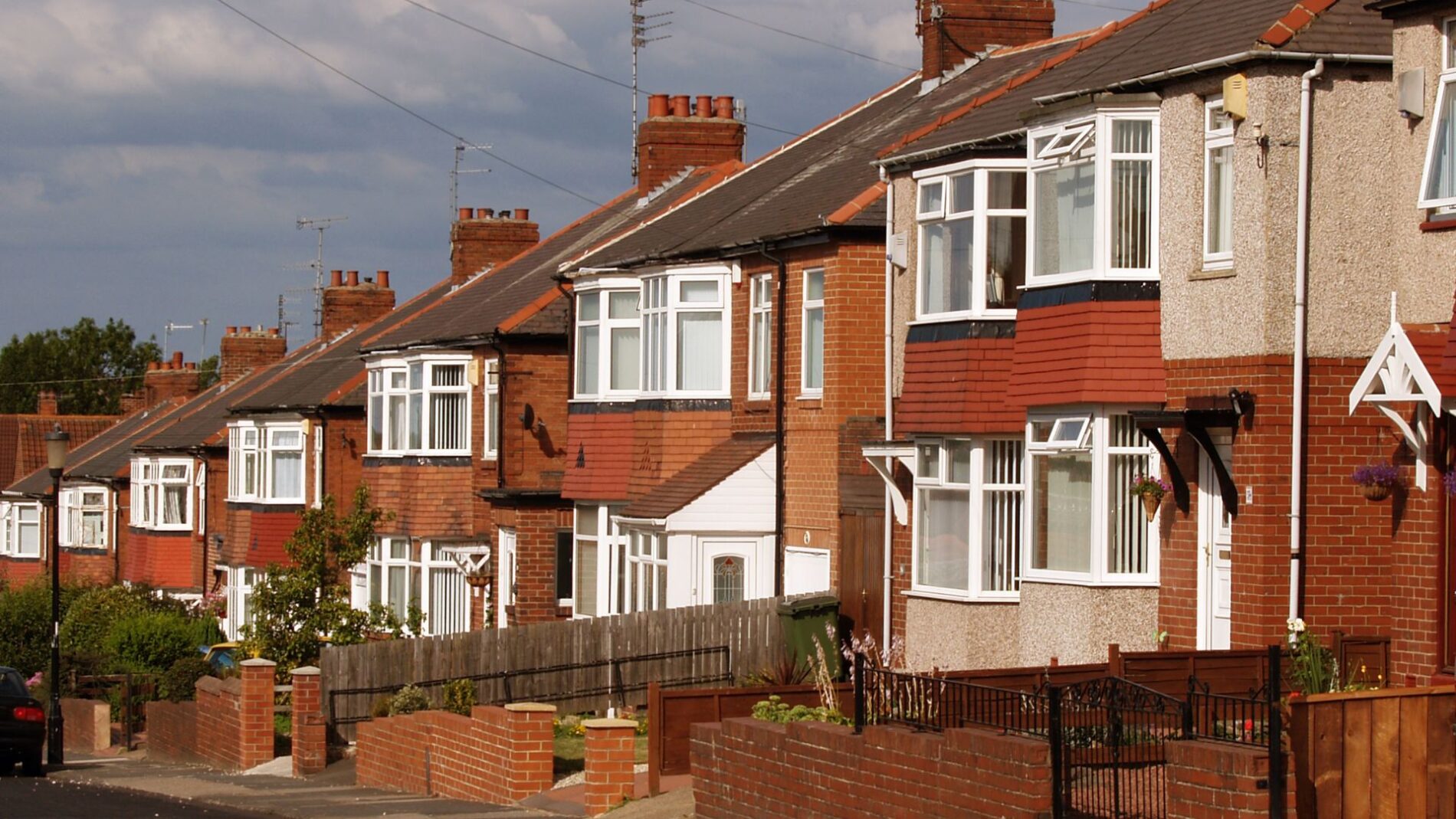 Well-maintained UK residential houses with quality roofing